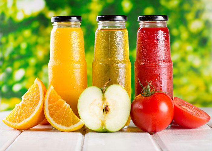 https://www.juicebuff.com/wp-content/uploads/2018/10/Orange-Apple-And-Tomato-Juices.jpg