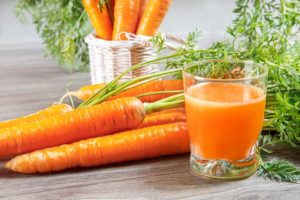 Carrots And Glass Of Juice For Healthy Skin