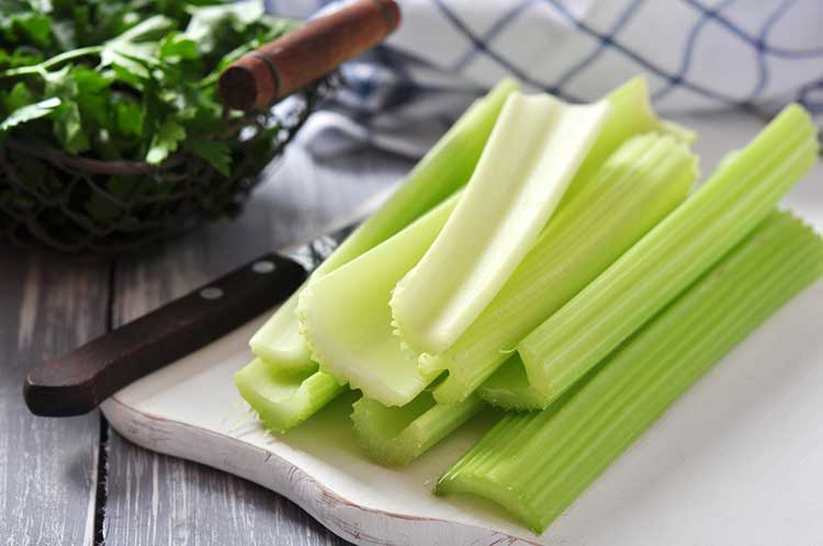 Celery On Chopping Board