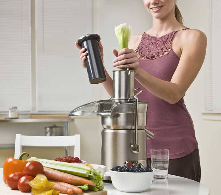 Woman enjoying The Benefits Of celery Juice And Carrots