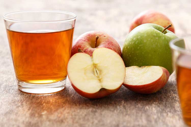 Apple Juice ready to be drank for its benefits