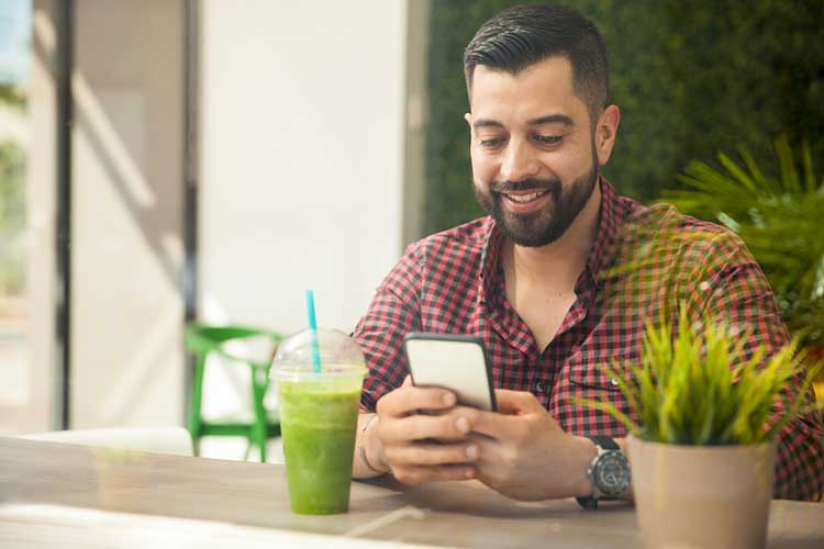 Man Enjoying A Juice Cleanse