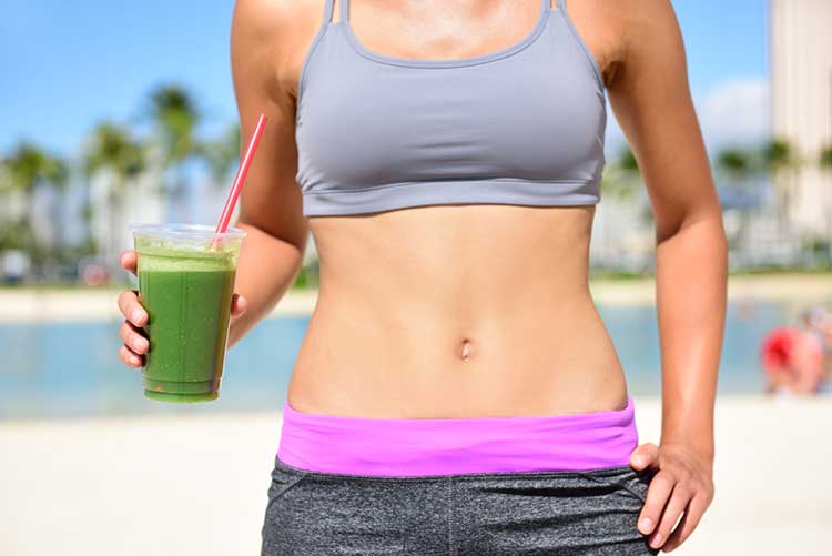 Woman Running With Green Juice